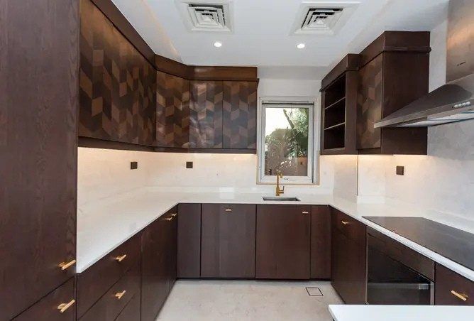 Open plan kitchen renovation removing walls Dubai